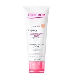 Cosmética femenina de la marca Topicrem, crema facial con color